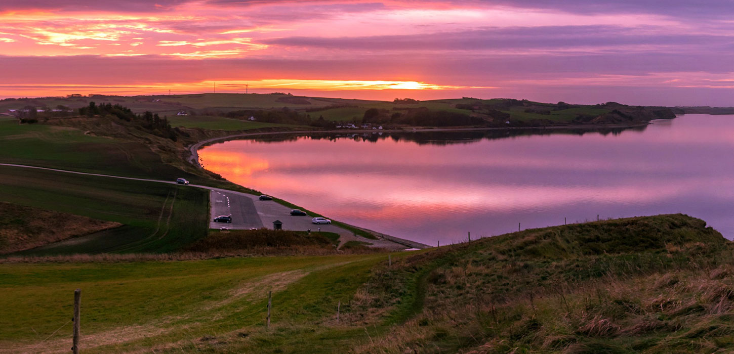 Toppen af Hanklit-solnedgang